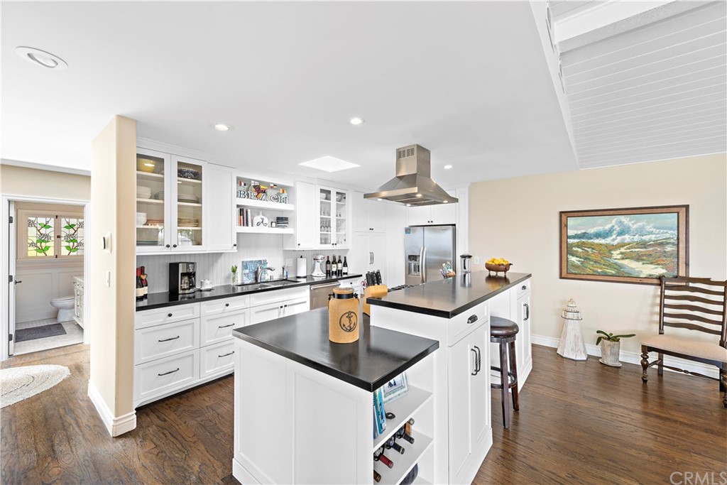 30852 Driftwood Drive Laguna Beach, CA 92651 - Photo 22 of 54 a open kitchen with stainless steel appliances granite countertop a stove and a refrigerator