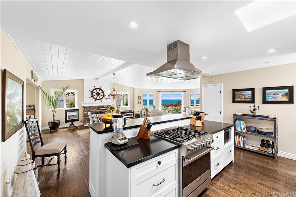 30852 Driftwood Drive Laguna Beach, CA 92651 - Photo 24 of 54 a living room with furniture and a flat screen tv