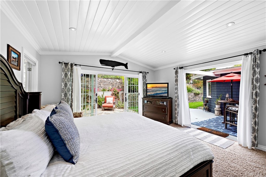 30852 Driftwood Drive Laguna Beach, CA 92651 - Photo 31 of 54 a bed room with a bed and a television