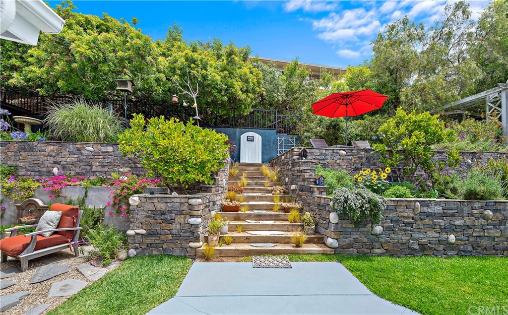 30852 Driftwood Drive Laguna Beach, CA 92651 - Photo 37 of 54 a front view of a house with a yard