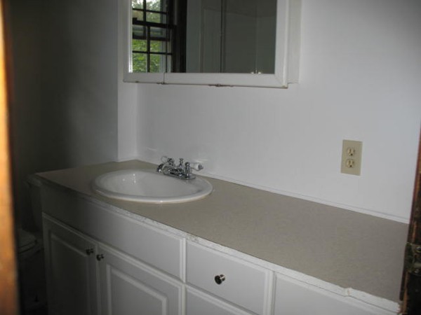 33 Douglas Road Dracut, MA 01826 - Photo 15 of 25 a close view of sink and tap