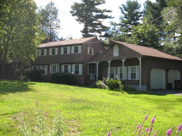33 Douglas Road Dracut, MA 01826 - Photo 3 of 25 a view of a house with a yard