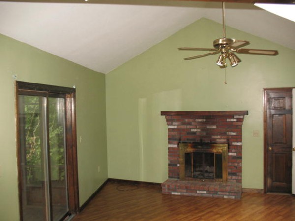 33 Douglas Road Dracut, MA 01826 - Photo 8 of 25 a view of a livingroom with a fireplace