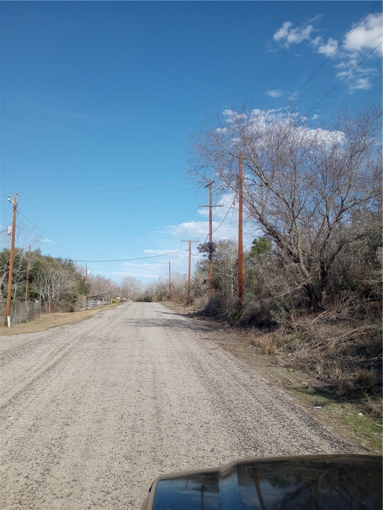 0 Fm 3024 Circle Mathis, TX 78368 - Photo 19 of 38 a view of a dry yard with wooden fence