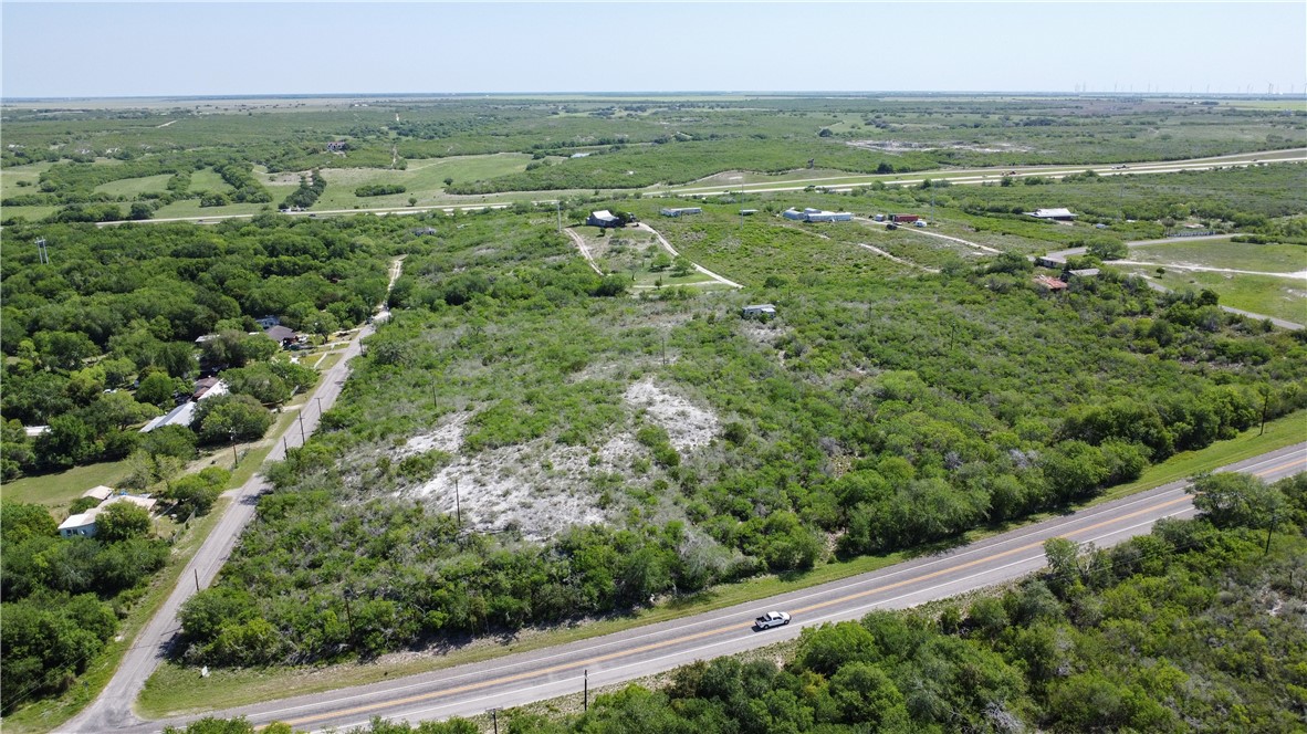 0 Fm 3024 Circle Mathis, TX 78368 - Photo 23 of 38 a view of a city with lush green forest