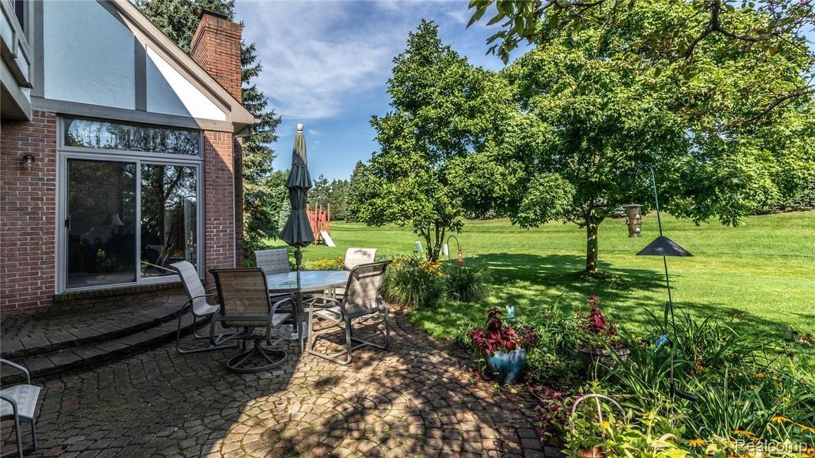 46550 Mornington Road Canton, MI 48188 - Photo 54 of 60 BACK OF HOME WITH BRICK PATIO