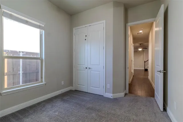 an empty room that has a window