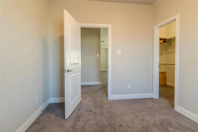 an empty room with closet