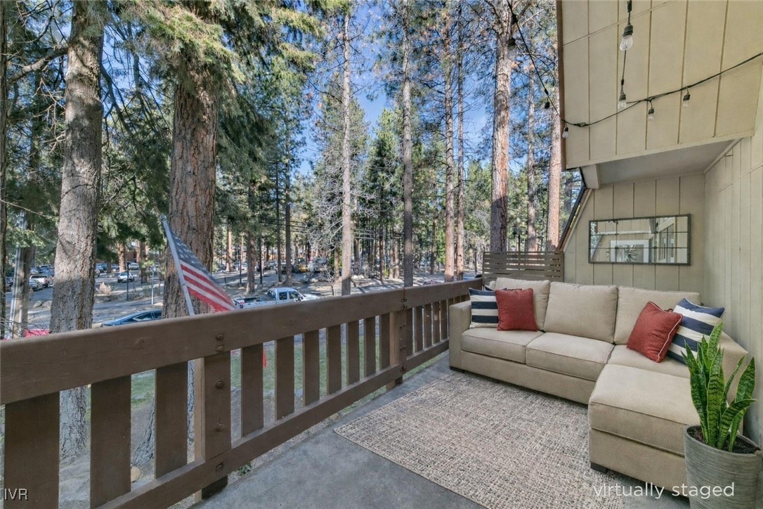 120 Country Club Drive, Unit 3 Incline Village, NV 89451 - Photo 5 of 38 a roof deck with couches and wooden floor