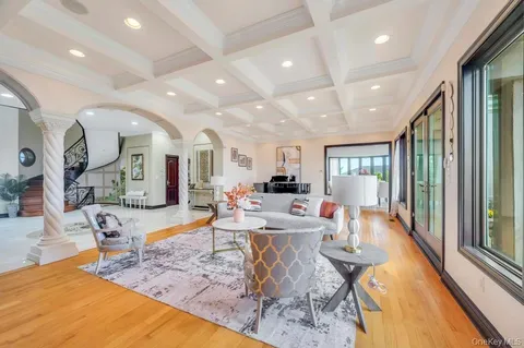 a kitchen with stainless steel appliances kitchen island granite countertop a stove and cabinets