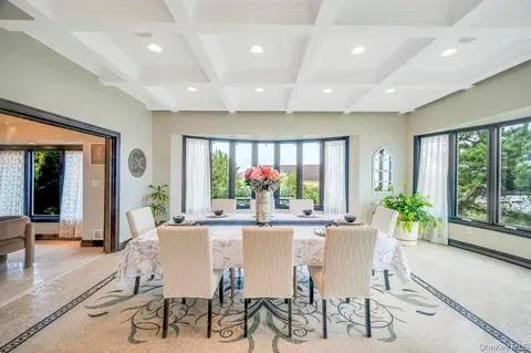 a view of pool with patio