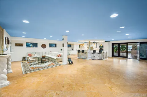 an outdoor space with wooden floor