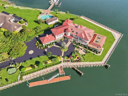 a front view of a building with garden