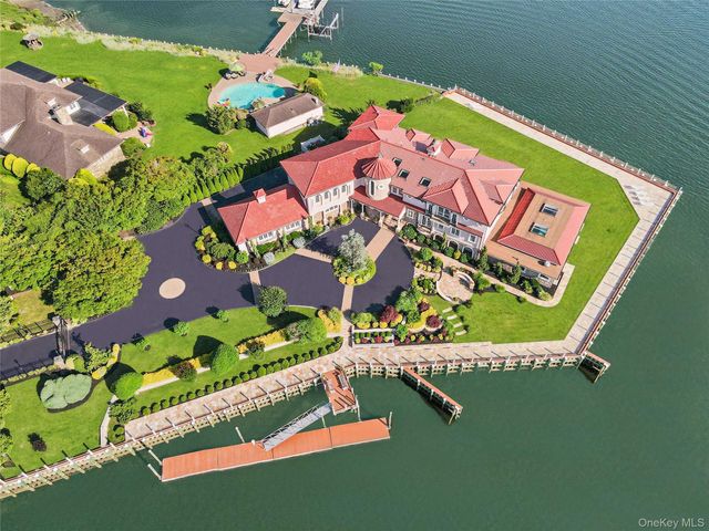 a front view of a building with garden