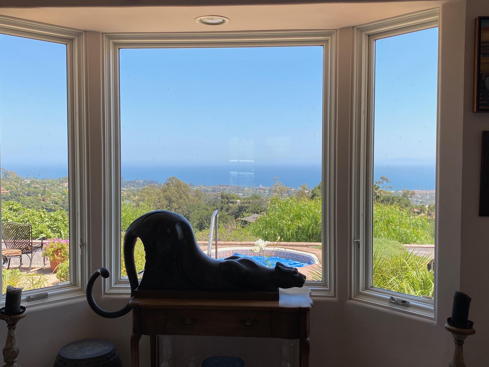 422 Las Alturas Road Santa Barbara, CA 93103 - Photo 1 of 8 dining room window with cat hr