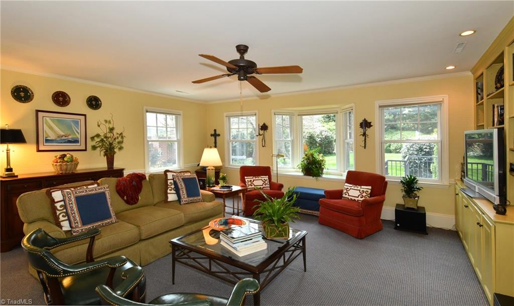 846 Arbor Road Winston-Salem, NC 27104 - Photo 8 of 26 Family room with fireplace and built-in shelves