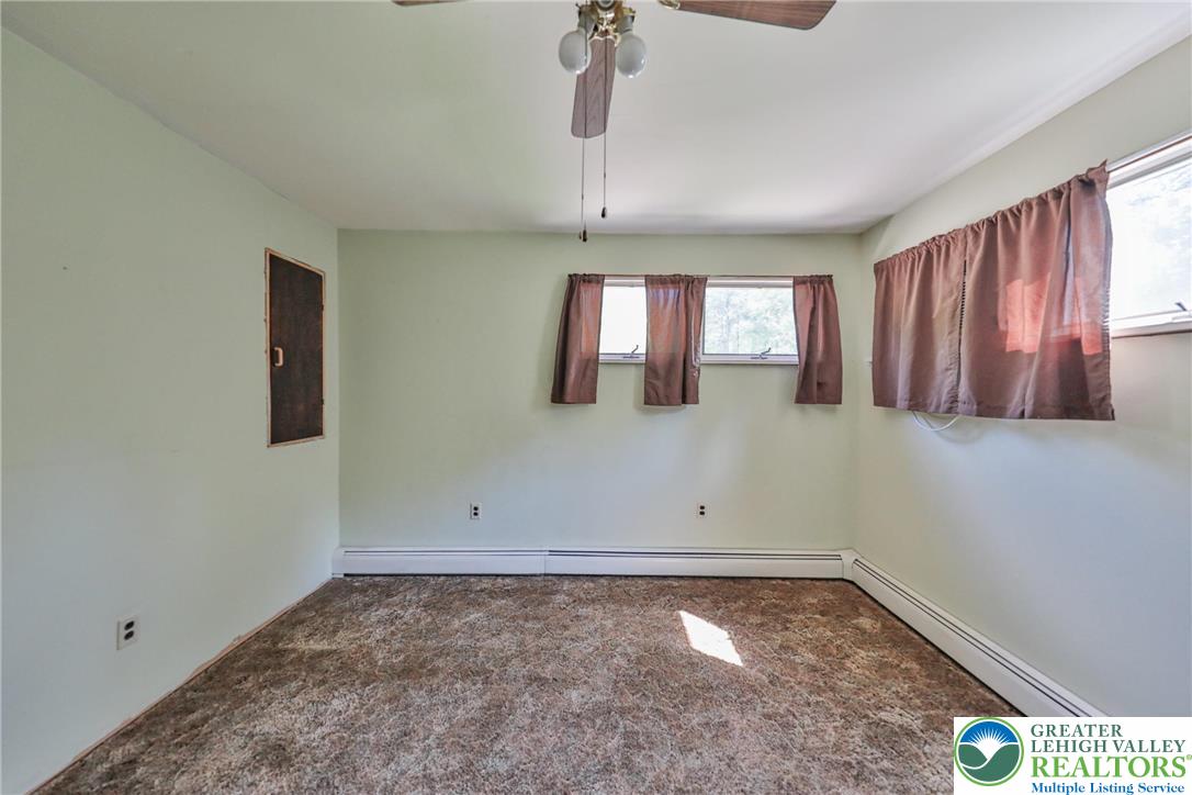 331 Cranberry Creek Road Cresco, PA 18326 - Photo 59 of 95 A quiet space with soft carpet flooring awaits your personal touch.