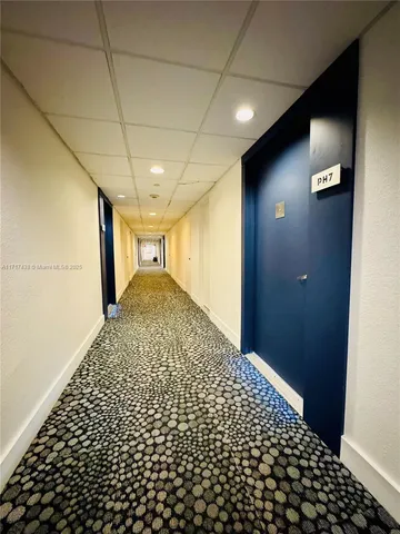 a view of a building with sitting area