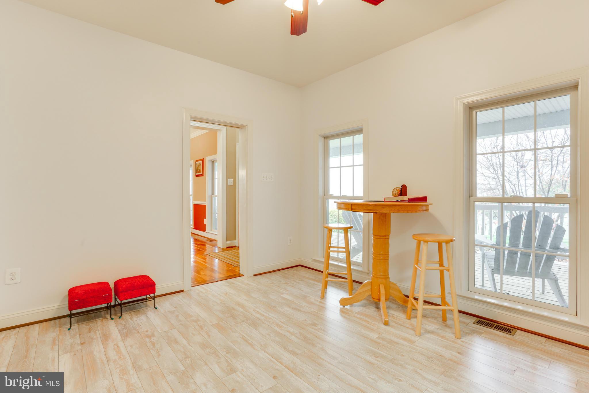8490 Mapleville Road Mount Airy, MD 21771 - Photo 21 of 30 an entryway at livingroom with furniture and wooden floor