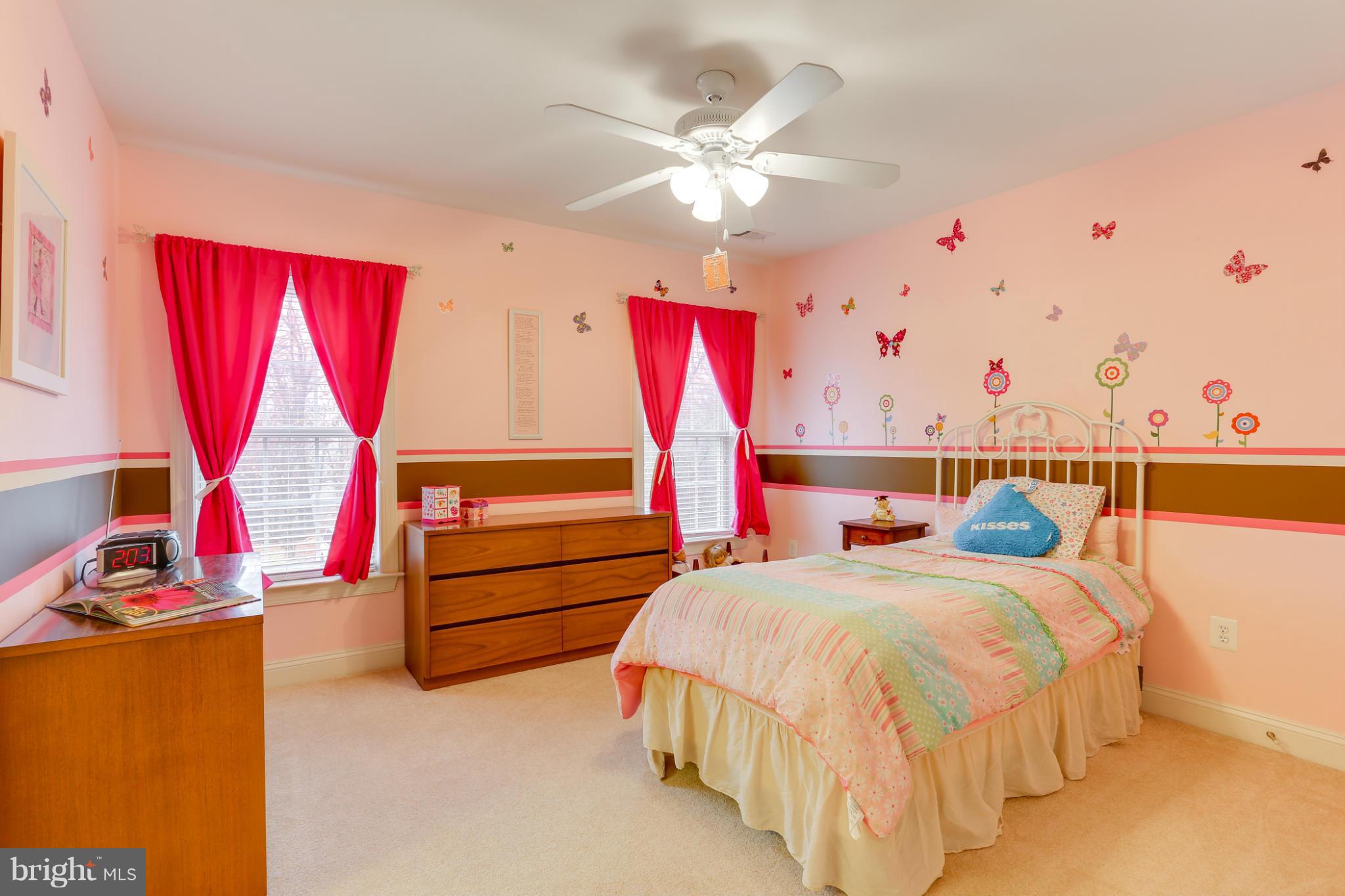 8490 Mapleville Road Mount Airy, MD 21771 - Photo 26 of 30 a bedroom with a bed and window