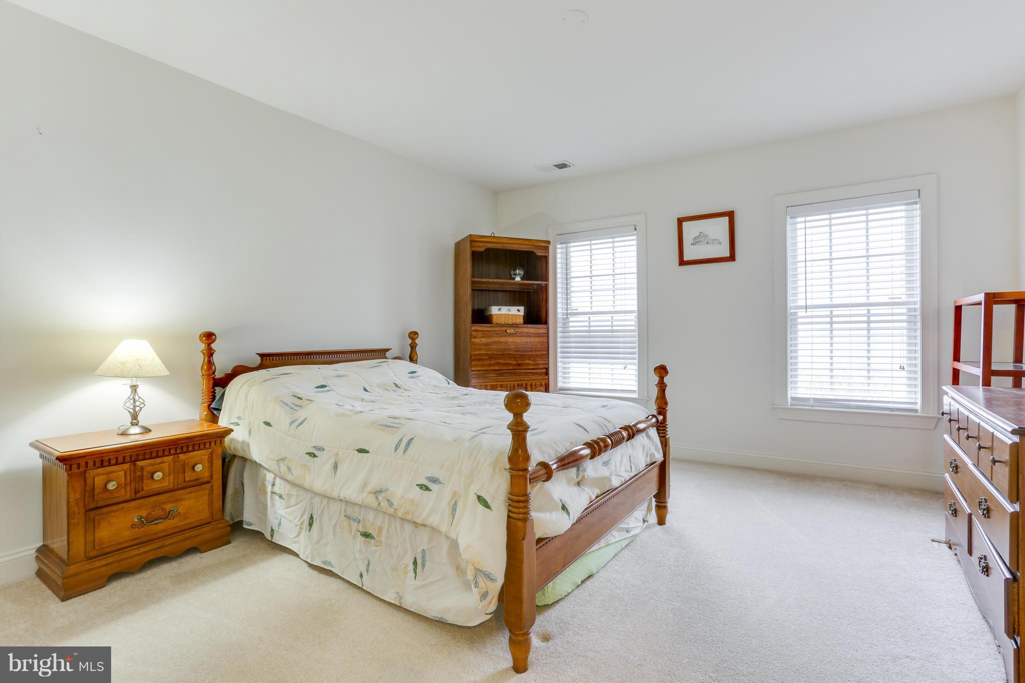 8490 Mapleville Road Mount Airy, MD 21771 - Photo 28 of 30 a bedroom with a bed and a window