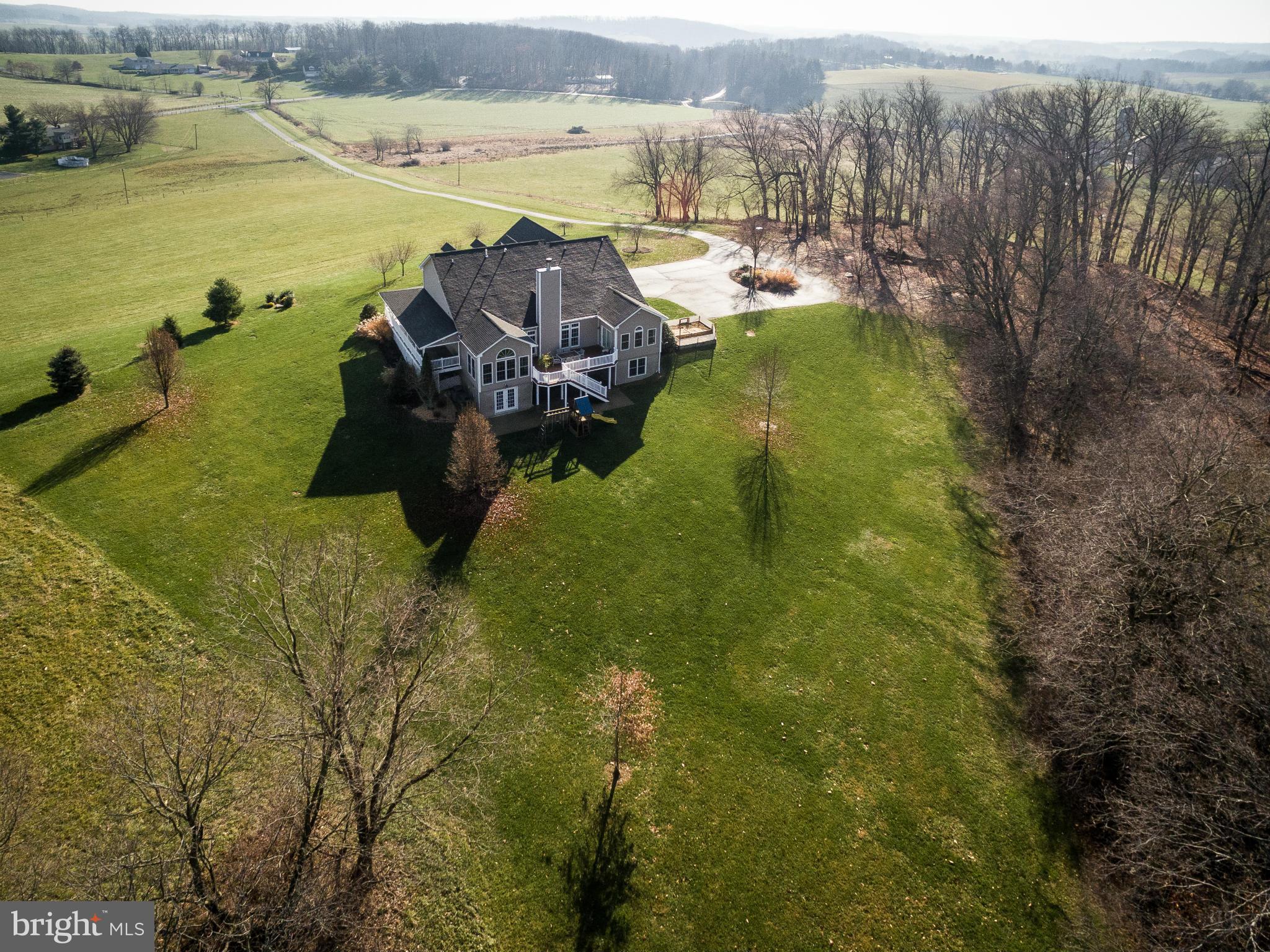8490 Mapleville Road Mount Airy, MD 21771 - Photo 30 of 30 a view of a lake with a mountain