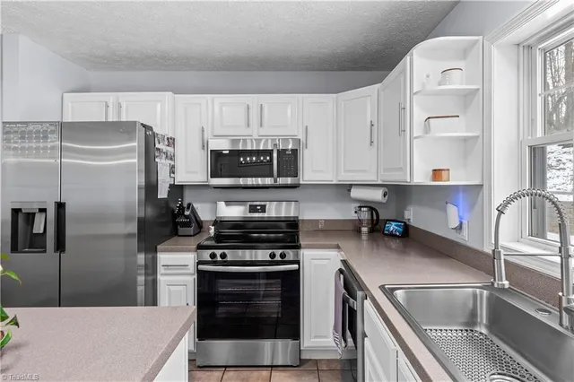 $450,000 | 1012 Tuckda Way, Hamptonville, NC 27020