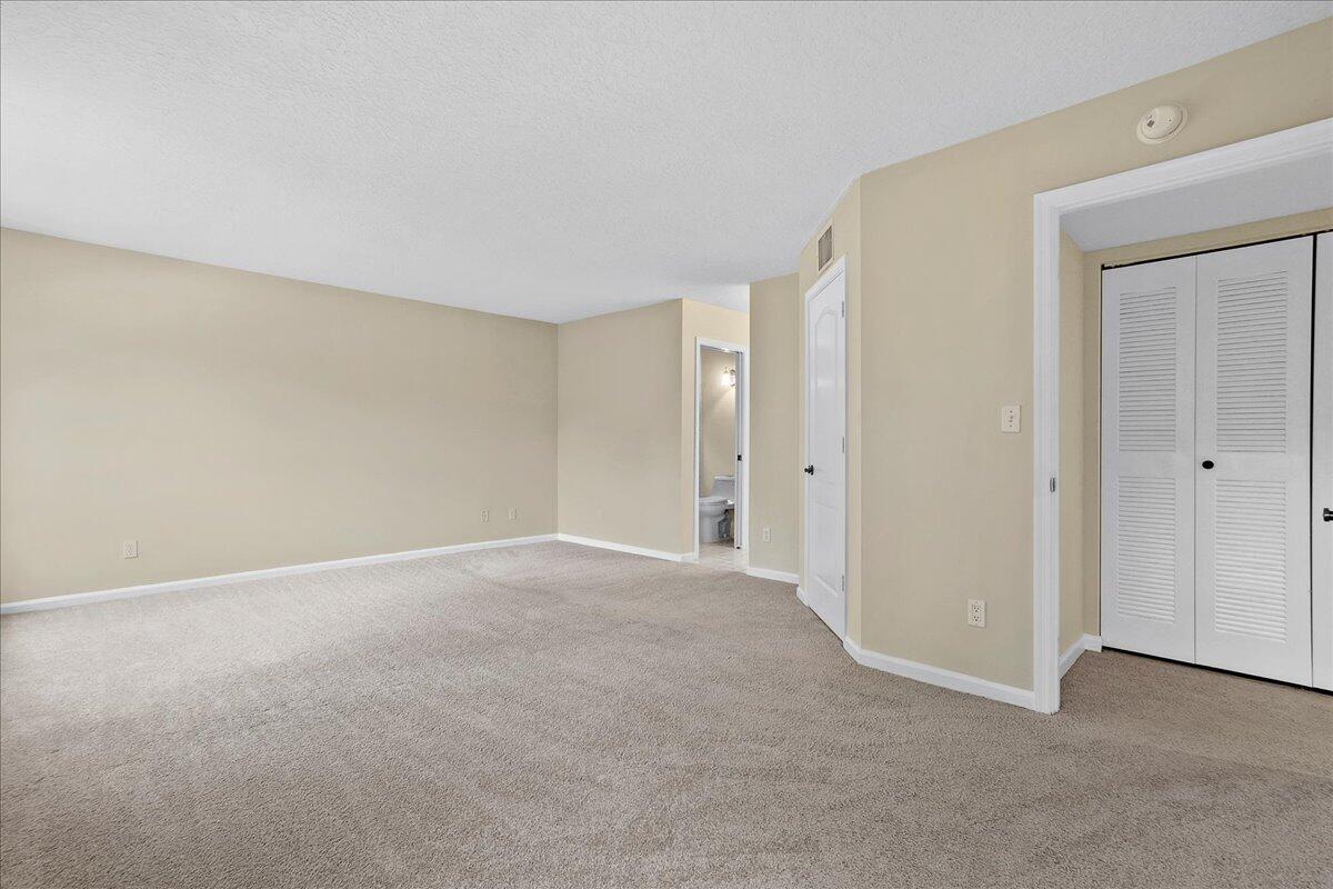 41 Uno Lago Drive Juno Beach, FL 33408 - Photo 13 of 31 a view of an empty room
