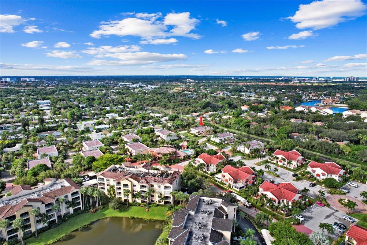 41 Uno Lago Drive Juno Beach, FL 33408 - Photo 23 of 31 an aerial view of residential houses with city view