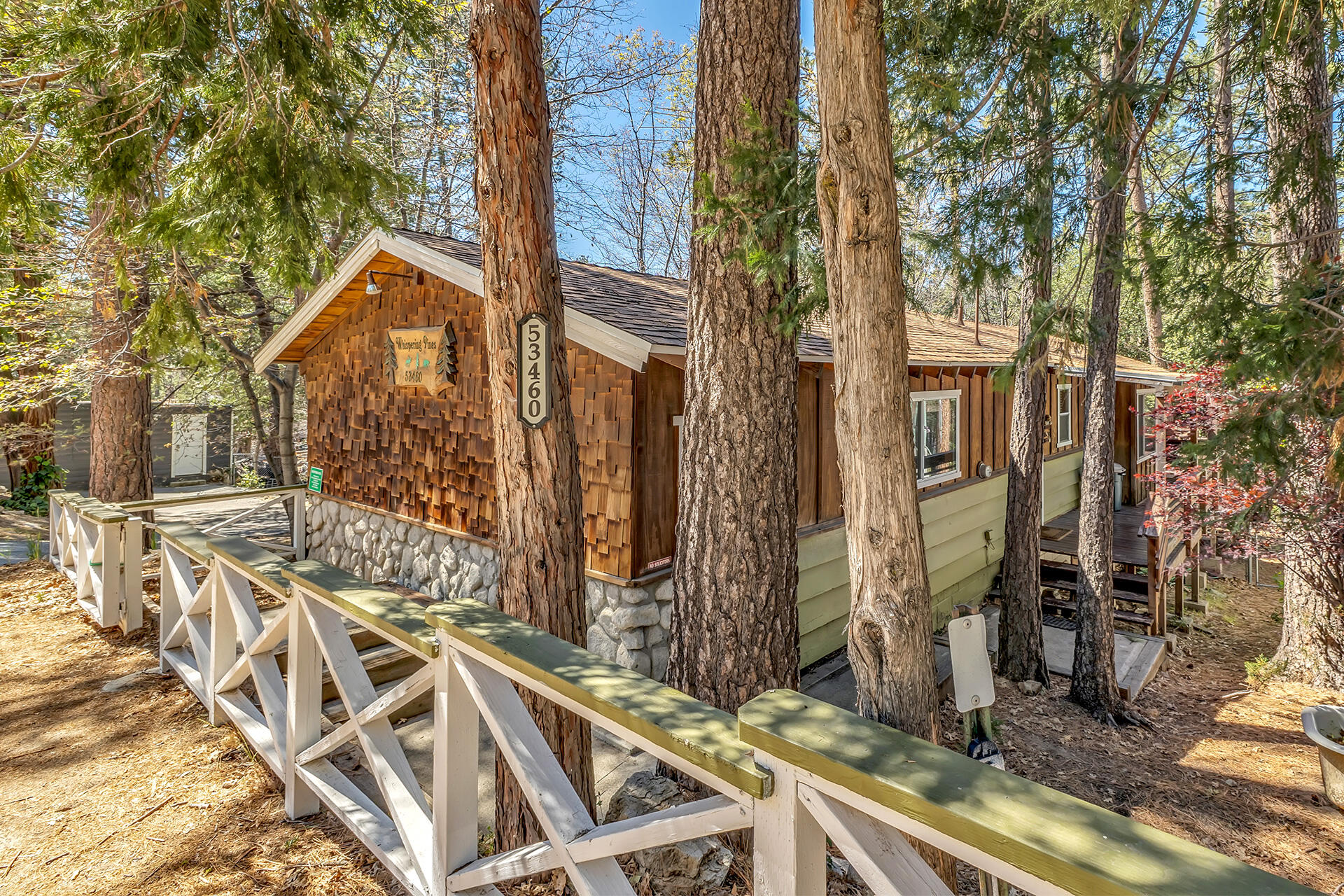 53460 Tollgate Road Idyllwild, CA 92549 - Photo 1 of 37 a view of a house with a yard and sitting area