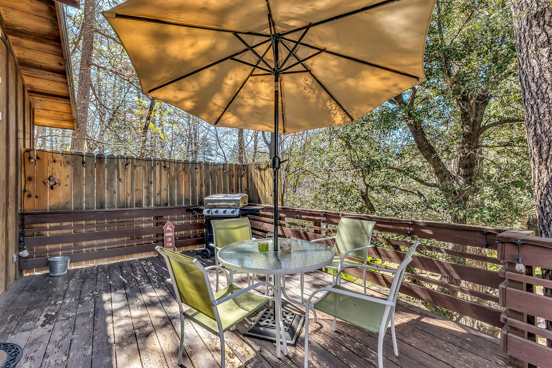 53460 Tollgate Road Idyllwild, CA 92549 - Photo 27 of 37 a patio with a patio table and chairs