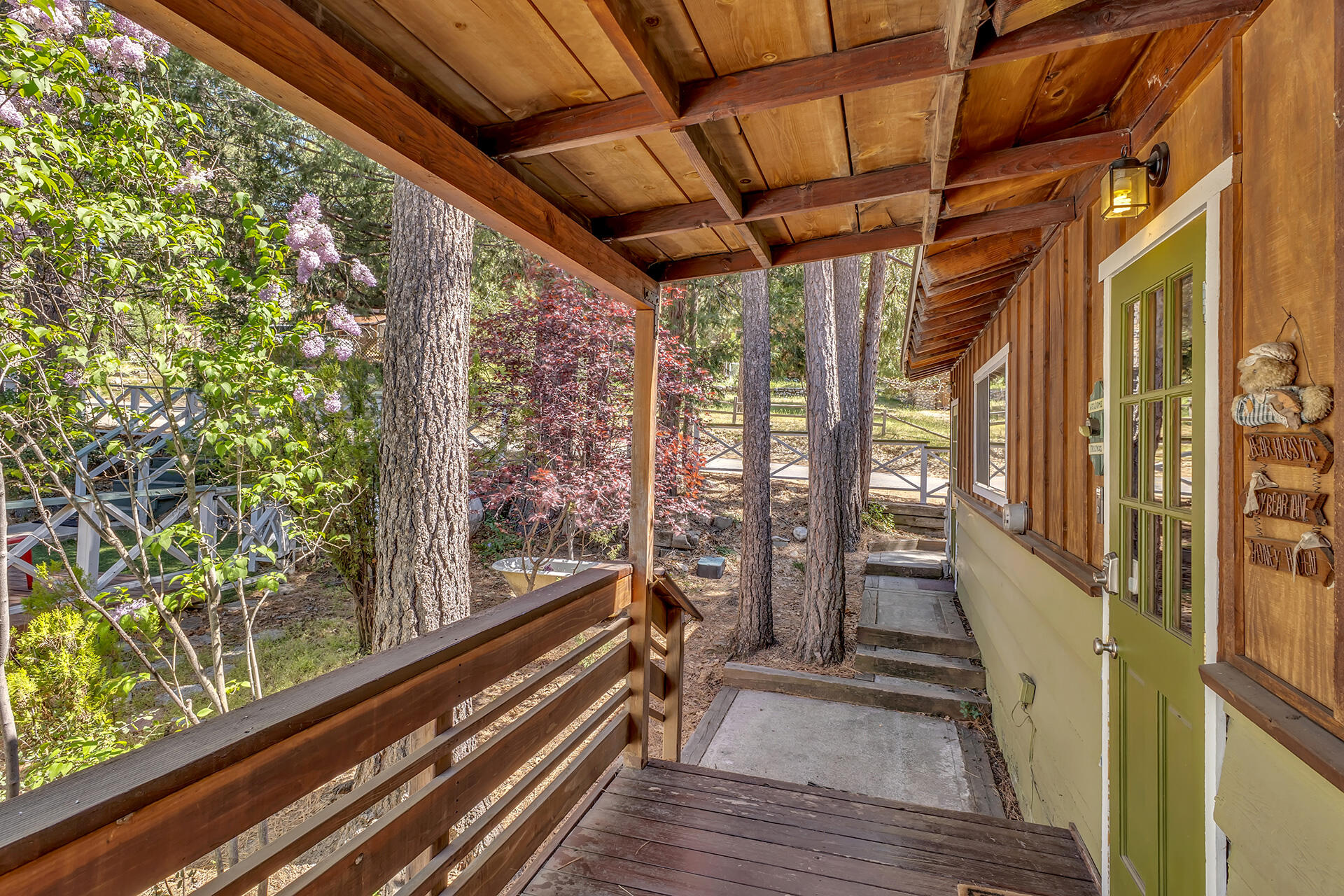 53460 Tollgate Road Idyllwild, CA 92549 - Photo 5 of 37 a view of a balcony with wooden floor and stairs