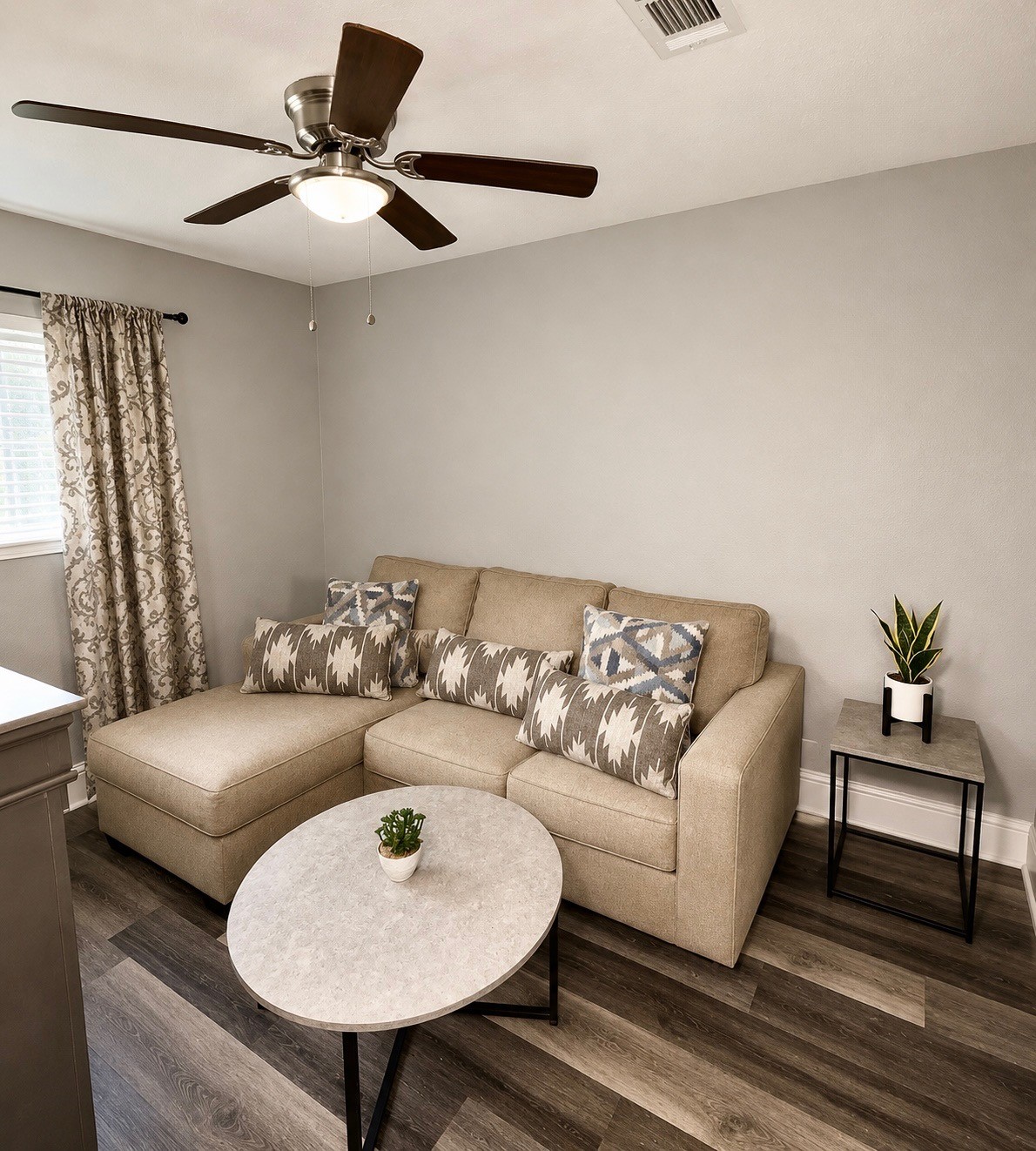 11939 Paramount Lane Houston, TX 77067 - Photo 5 of 9 a living room with furniture and a rug