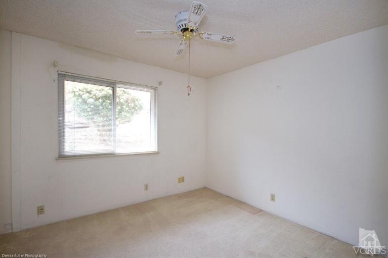 4258 Laurelhurst Road Moorpark, CA 93021 - Photo 22 of 28 an empty room with a window and a ceiling fan