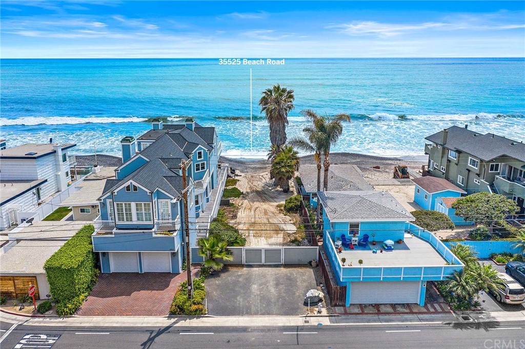 35525 Beach Road Dana Point, CA 92624 - Photo 1 of 1 a front view of a house with a yard