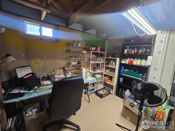 a room with a wooden floor and musical instruments