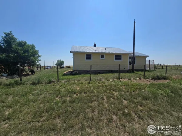 a house view with a garden space