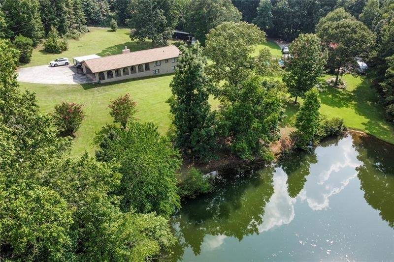 42 Spruce Path Dallas, GA 30157 - Photo 1 of 1 a aerial view of a house with a yard
