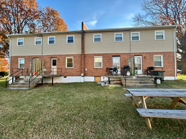 a house view with outdoor seating space