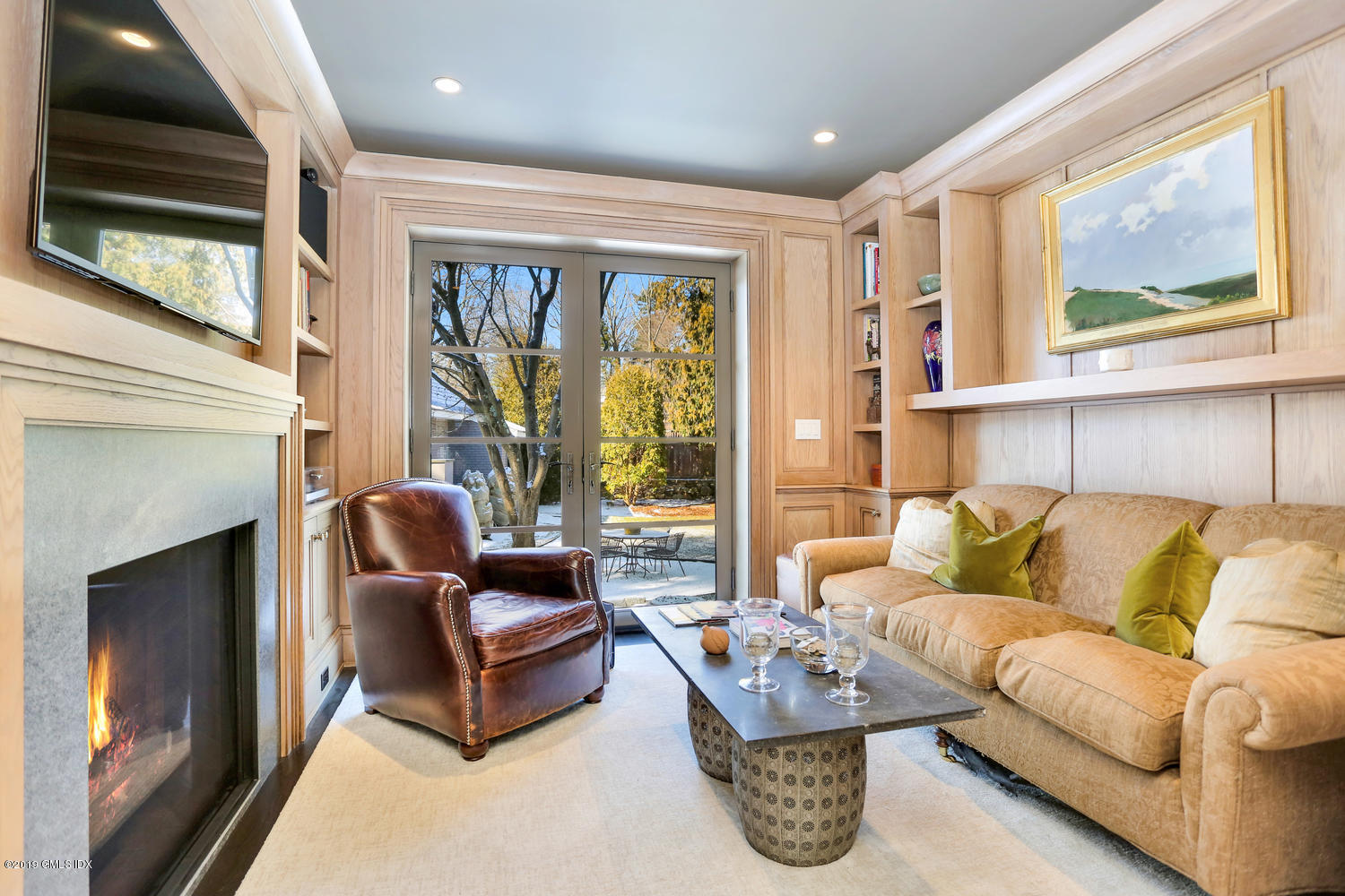 56 Old Church Road Greenwich, CT 06830 - Photo 13 of 41 a living room with furniture and a fireplace