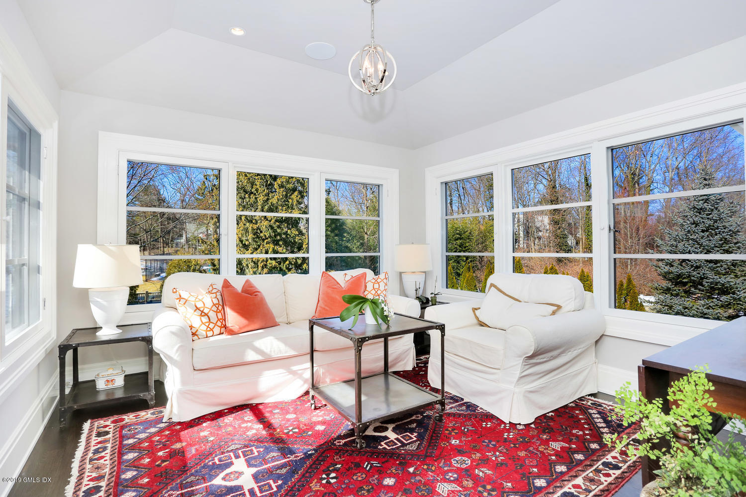 56 Old Church Road Greenwich, CT 06830 - Photo 18 of 41 a living room with furniture large window and wooden floor