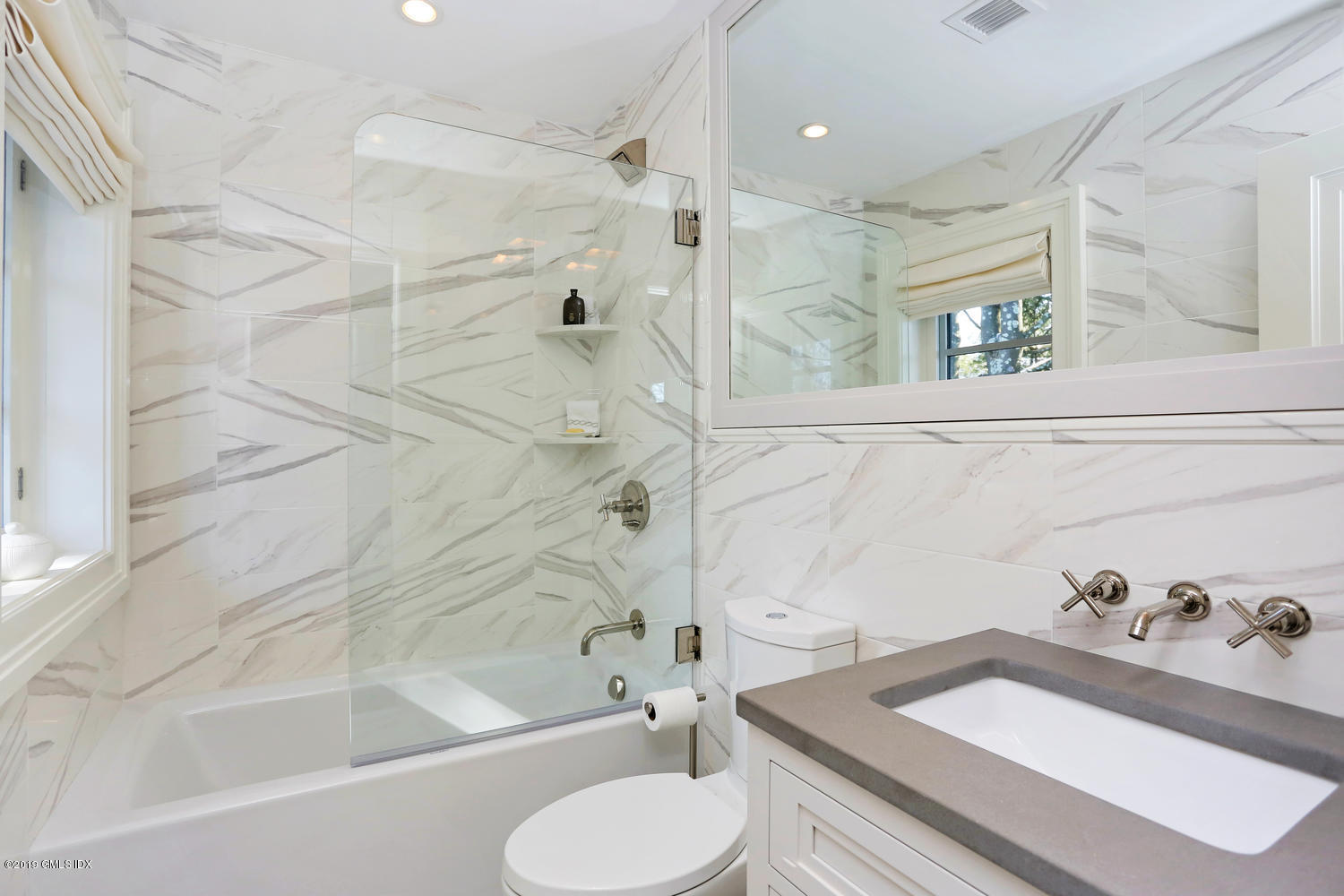 56 Old Church Road Greenwich, CT 06830 - Photo 20 of 41 a bathroom with a sink toilet and shower