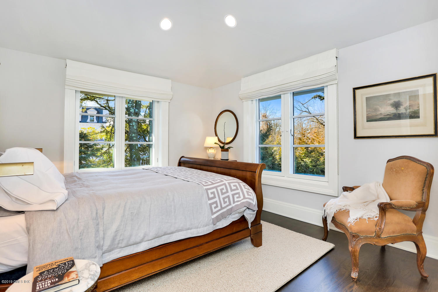 56 Old Church Road Greenwich, CT 06830 - Photo 21 of 41 a bedroom with a bed chair and a window