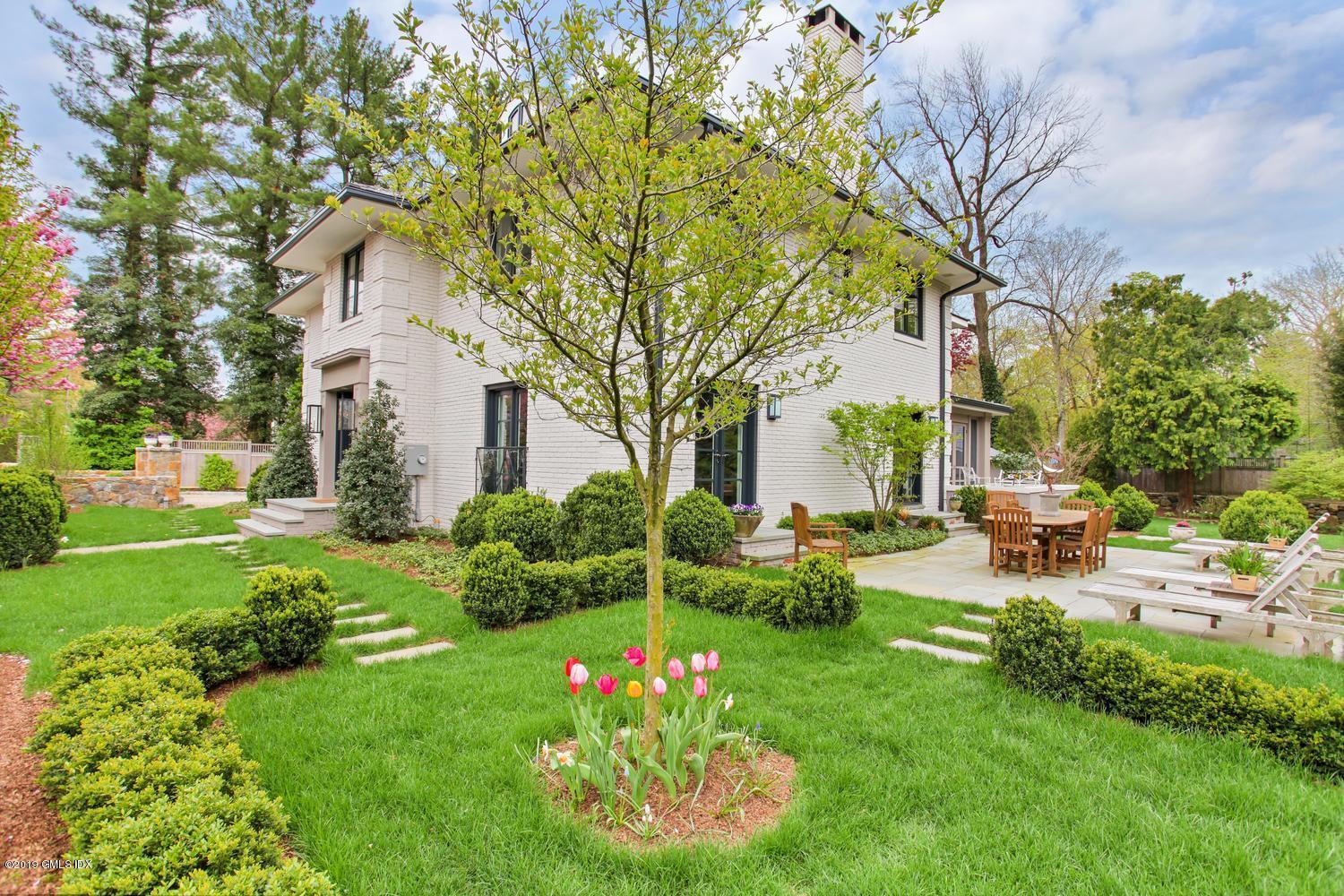 56 Old Church Road Greenwich, CT 06830 - Photo 30 of 41 a view of a house with backyard and sitting area