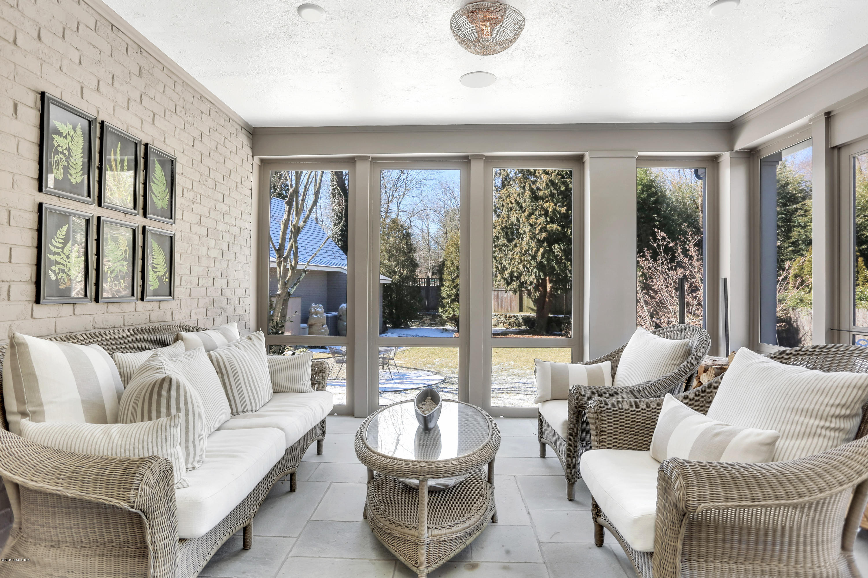 56 Old Church Road Greenwich, CT 06830 - Photo 7 of 41 a living room with furniture and a large window