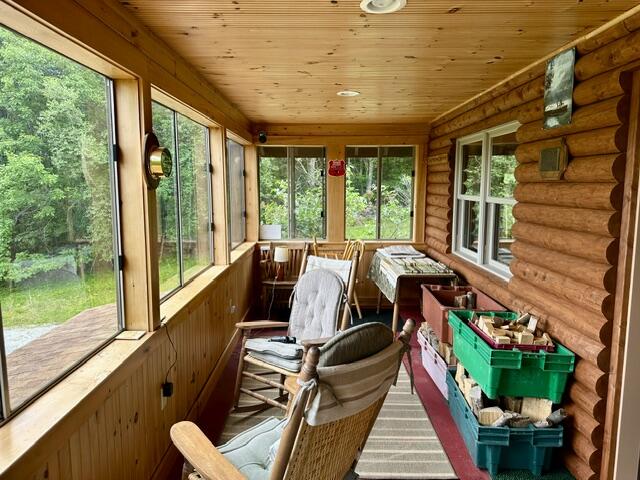 156 Hussey Road Parsonsfield, ME 04047 - Photo 9 of 25 9. Three Season Porch - 1
