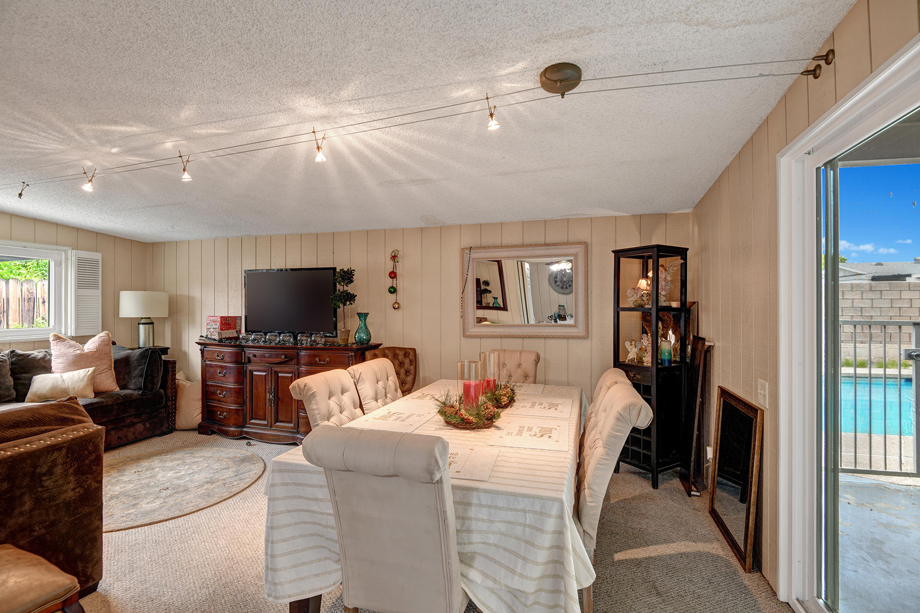 81850 Victoria Street Indio, CA 92201 - Photo 15 of 17 a bedroom with furniture and a flat screen tv