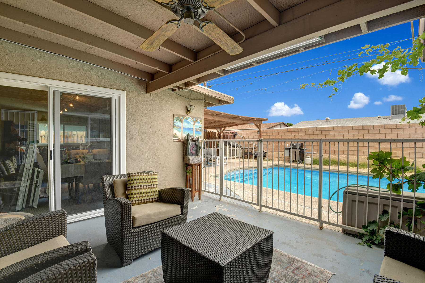 81850 Victoria Street Indio, CA 92201 - Photo 16 of 17 a balcony with furniture and a potted plant