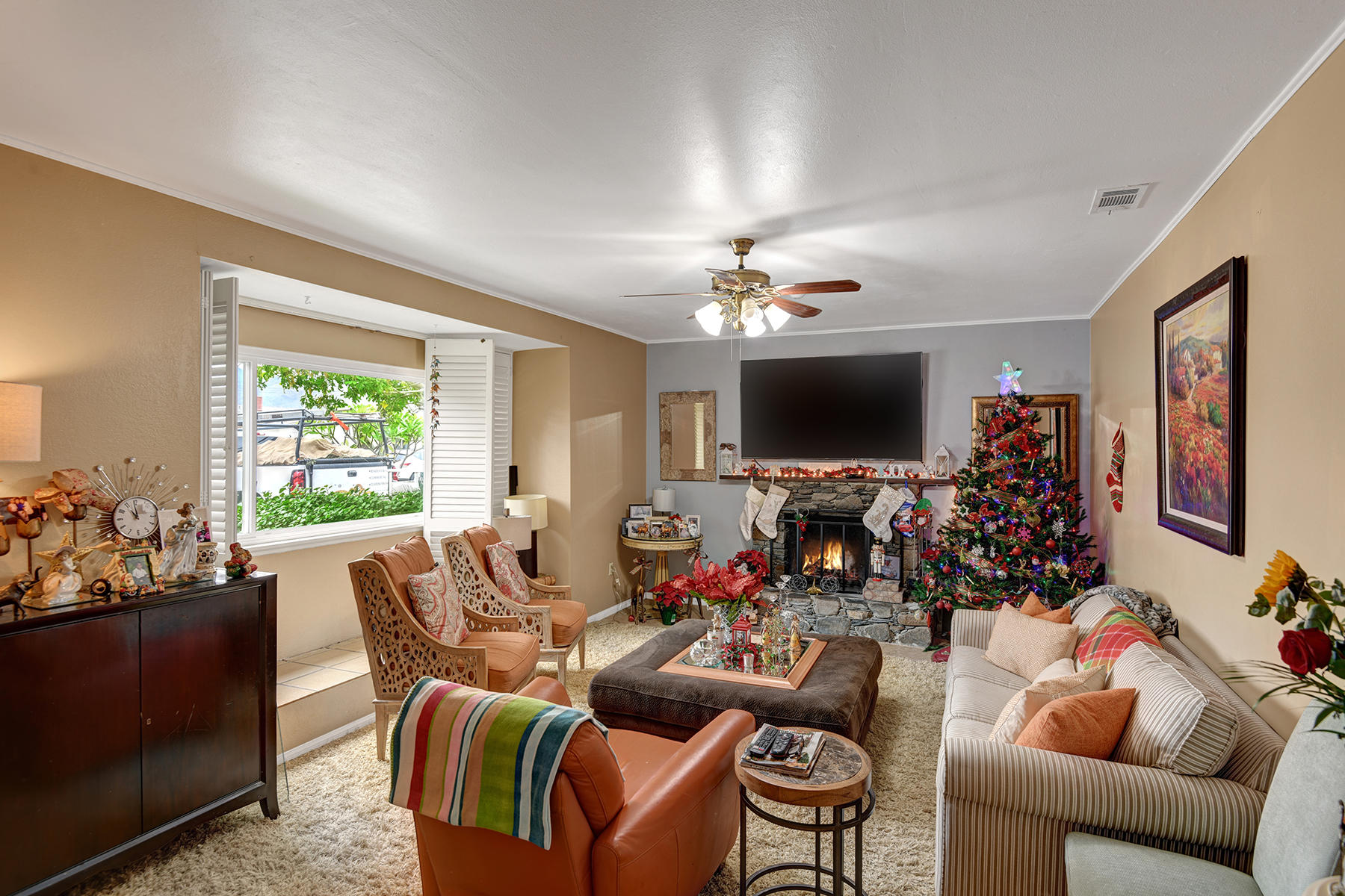 81850 Victoria Street Indio, CA 92201 - Photo 3 of 17 a living room with furniture and a flat screen tv
