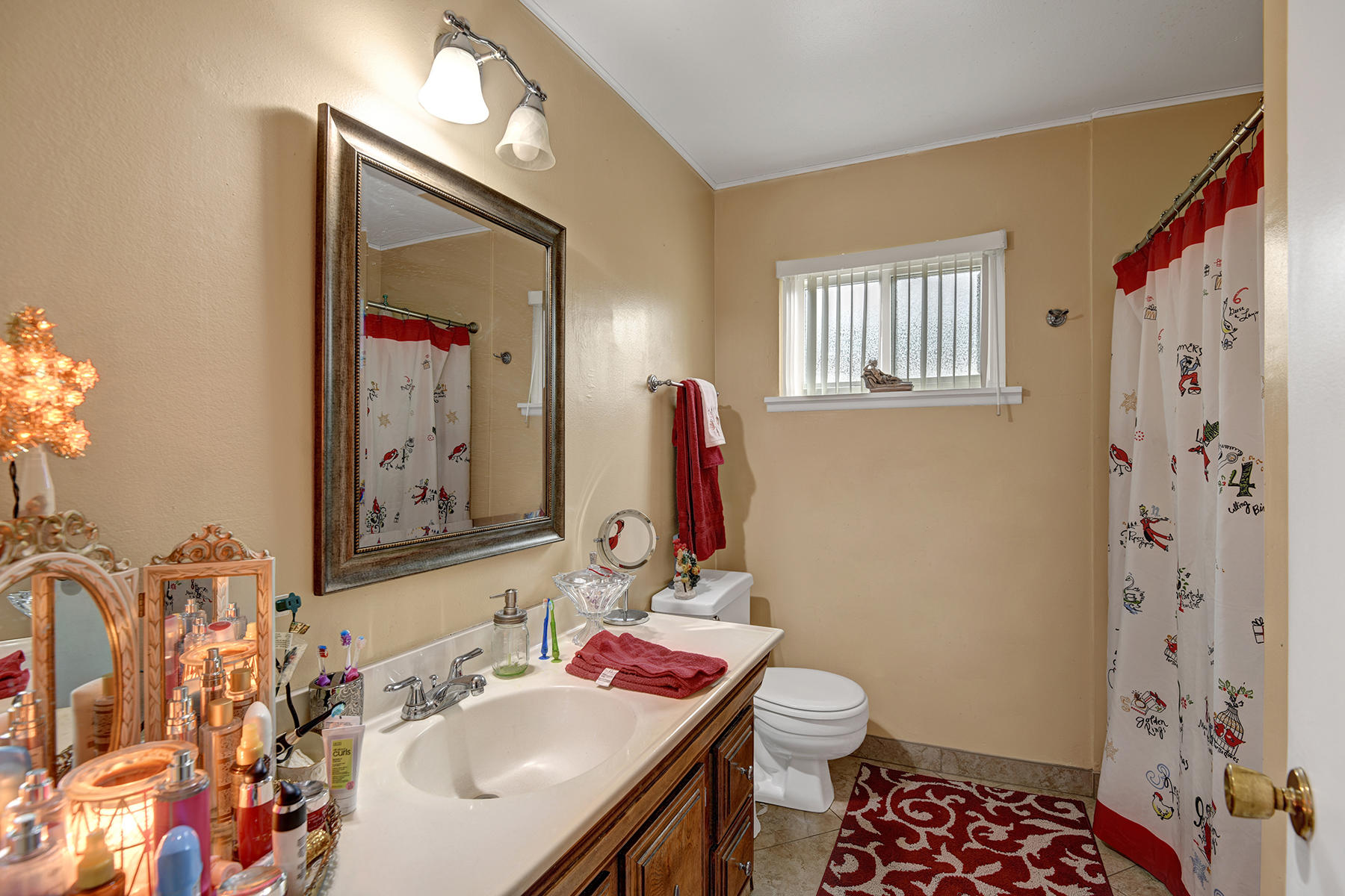 81850 Victoria Street Indio, CA 92201 - Photo 5 of 17 a bathroom with a sink toilet and shower